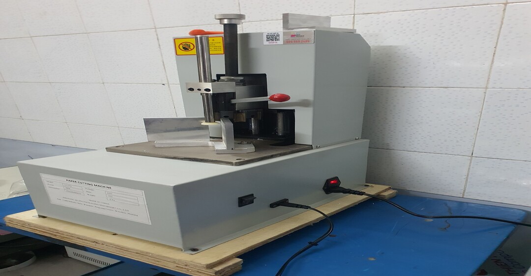 sửa máy bo góc giấy