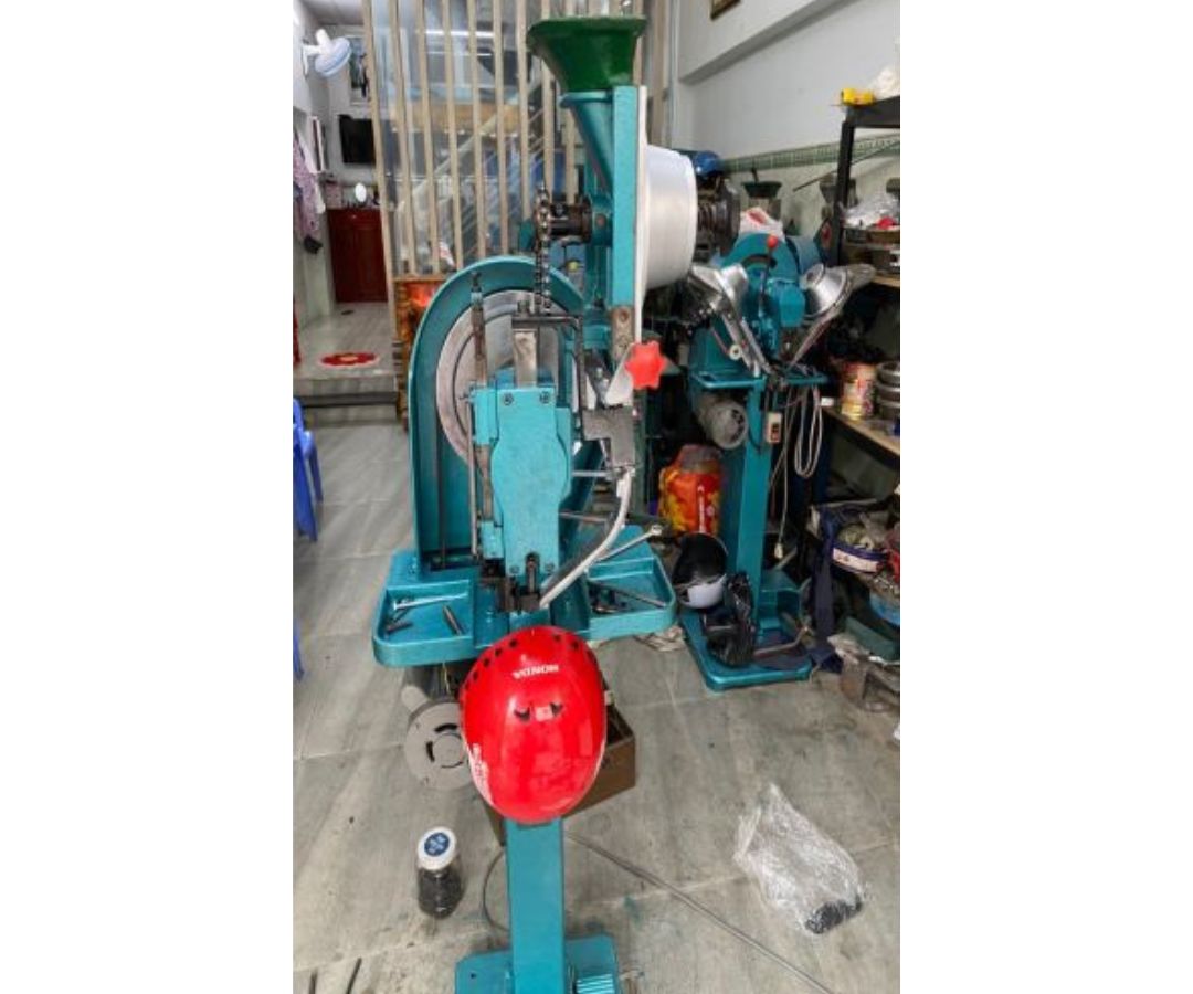 sửa máy đóng nút nón bảo hiểm