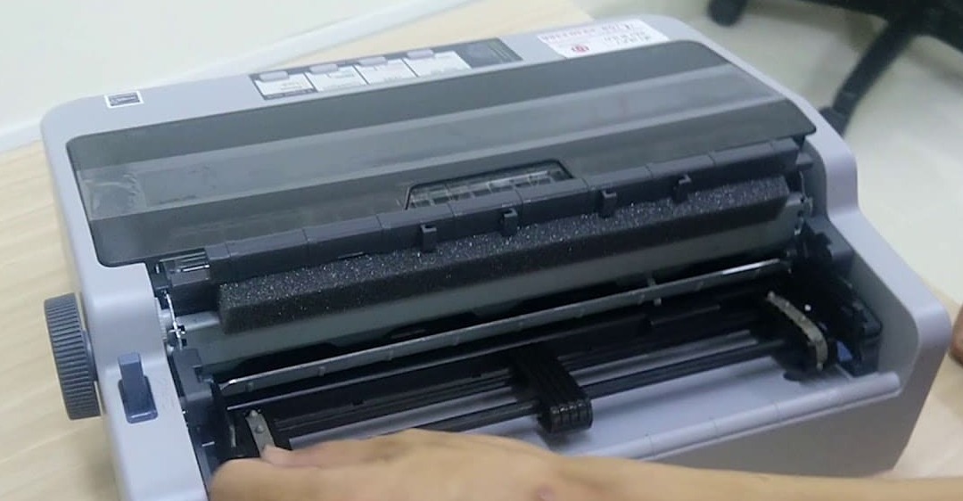 máy in epson bị lệch giấy