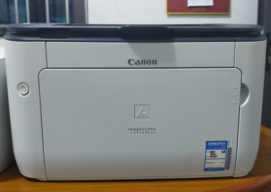 Cách nhận biết máy in Canon chính hãng qua tem dán trên máy in