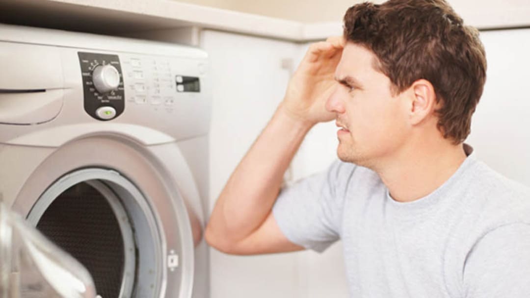 Tắt máy giặt khi đang giặt có sao không
